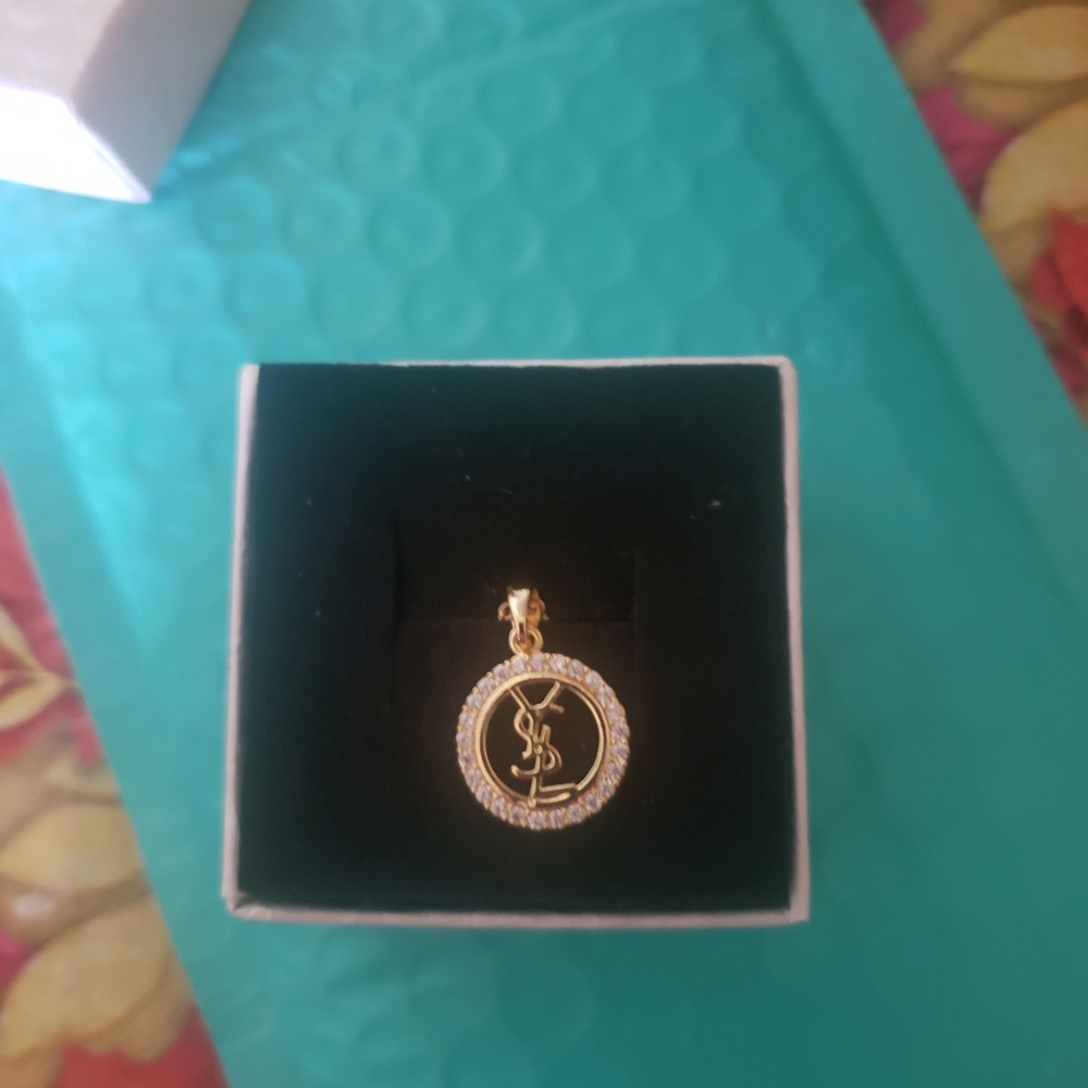 Gold and Black Round Pendant Necklace with Crystal Halo